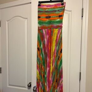 Summer sleeveless high-low maxi dress with slight open back detail.